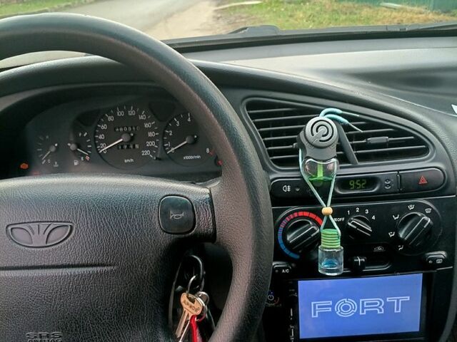 Серый Дэу Ланос, объемом двигателя 1.5 л и пробегом 100 тыс. км за 1800 $, фото 4 на Automoto.ua