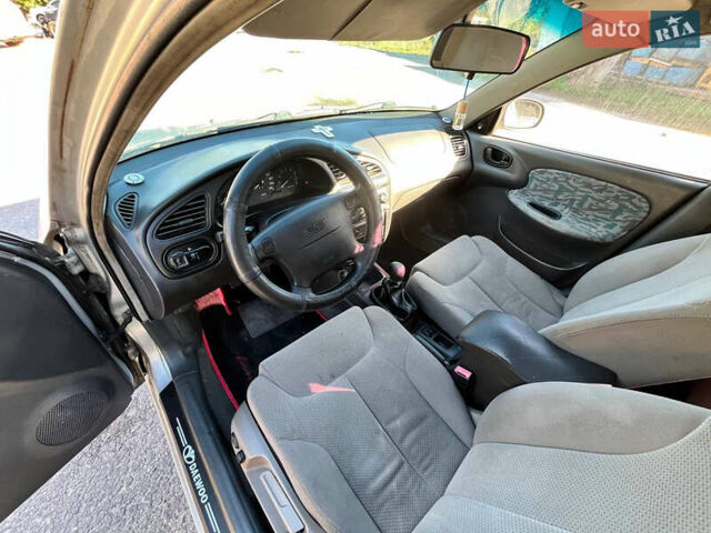 Сірий Деу Ланос, об'ємом двигуна 1.6 л та пробігом 281 тис. км за 2300 $, фото 8 на Automoto.ua