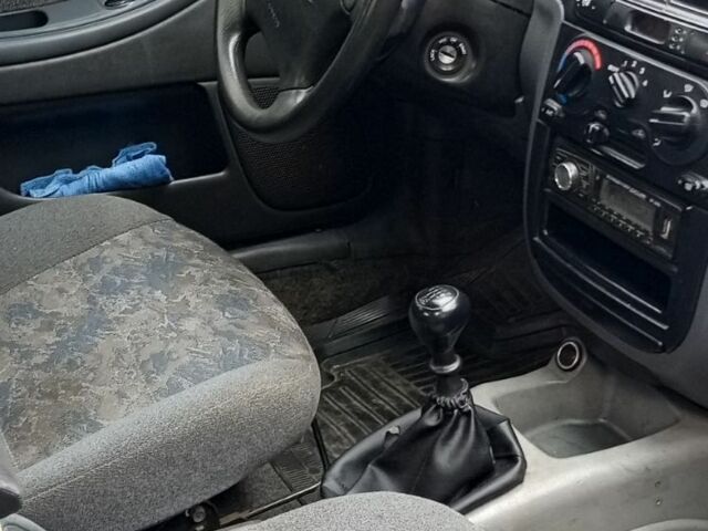 Серый Дэу Ланос, объемом двигателя 1.5 л и пробегом 200 тыс. км за 2000 $, фото 2 на Automoto.ua