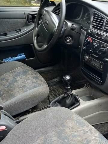 Серый Дэу Ланос, объемом двигателя 1.5 л и пробегом 200 тыс. км за 2000 $, фото 1 на Automoto.ua