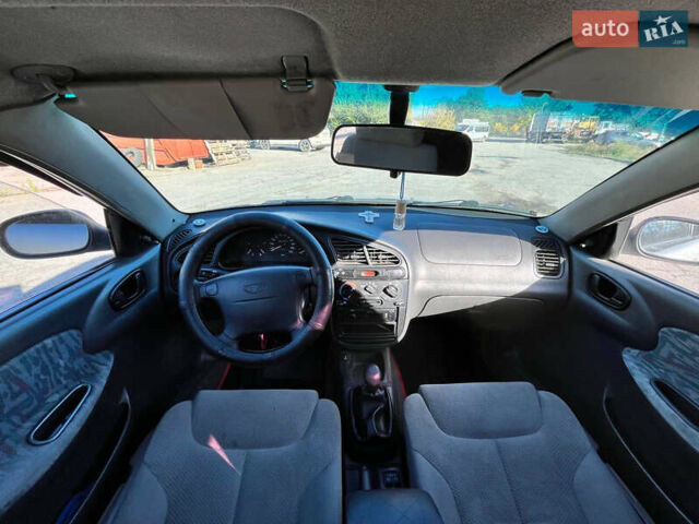 Сірий Деу Ланос, об'ємом двигуна 1.6 л та пробігом 281 тис. км за 2300 $, фото 9 на Automoto.ua