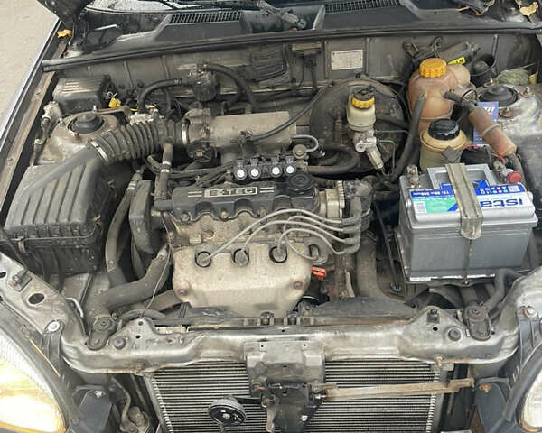 Сірий Деу Ланос, об'ємом двигуна 1.5 л та пробігом 268 тис. км за 2300 $, фото 10 на Automoto.ua