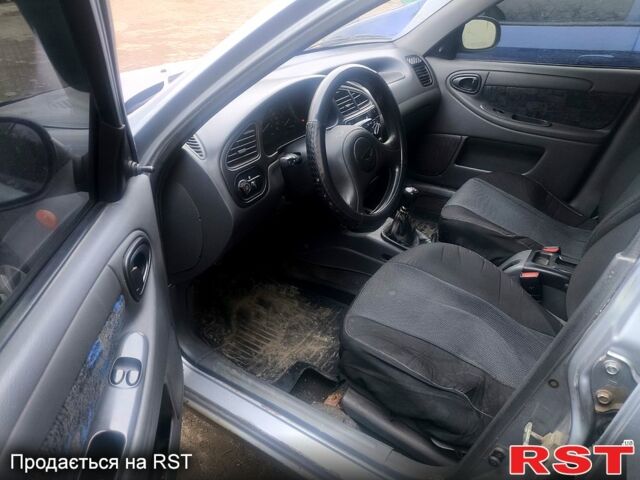 Серый Дэу Ланос, объемом двигателя 1.5 л и пробегом 241 тыс. км за 2750 $, фото 5 на Automoto.ua