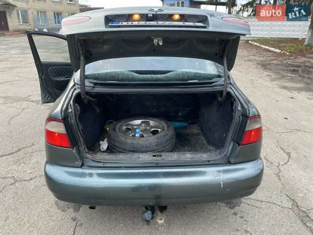 Серый Дэу Ланос, объемом двигателя 1.5 л и пробегом 432 тыс. км за 2400 $, фото 19 на Automoto.ua