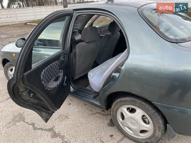 Серый Дэу Ланос, объемом двигателя 1.5 л и пробегом 432 тыс. км за 2400 $, фото 10 на Automoto.ua