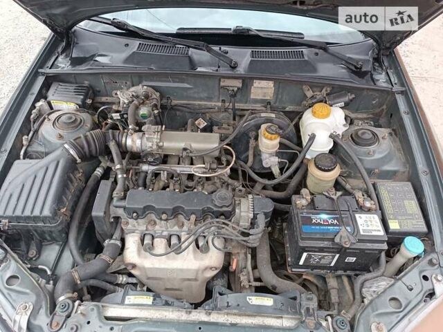 Дэу Ланос 1998 в Днепре (Днепропетровске) на Automoto.ua Серый Дэу Ланос, объемом двигателя 1.5 л и пробегом 220 тыс. км за 2299 $, фото 8 на Automoto.ua
