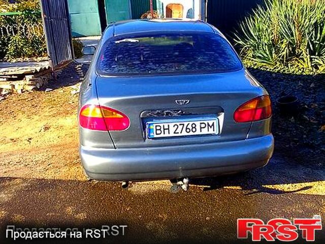 Серый Дэу Ланос, объемом двигателя 1.5 л и пробегом 272 тыс. км за 1500 $, фото 3 на Automoto.ua