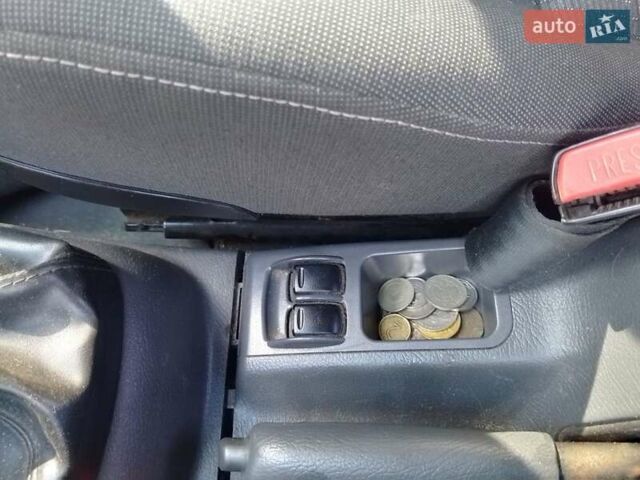 Сірий Деу Ланос, об'ємом двигуна 1.5 л та пробігом 250 тис. км за 1599 $, фото 11 на Automoto.ua