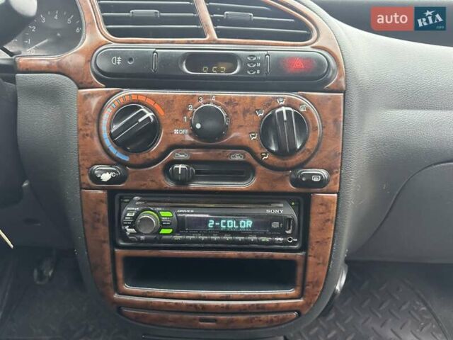 Сірий Деу Ланос, об'ємом двигуна 1.5 л та пробігом 220 тис. км за 1550 $, фото 16 на Automoto.ua