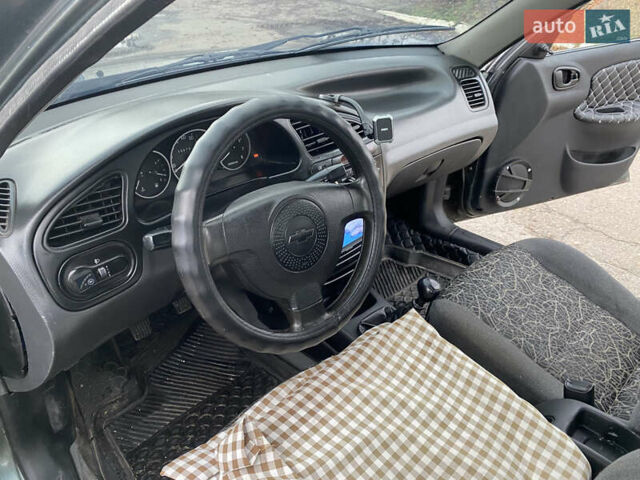 Серый Дэу Ланос, объемом двигателя 1.5 л и пробегом 432 тыс. км за 2400 $, фото 12 на Automoto.ua