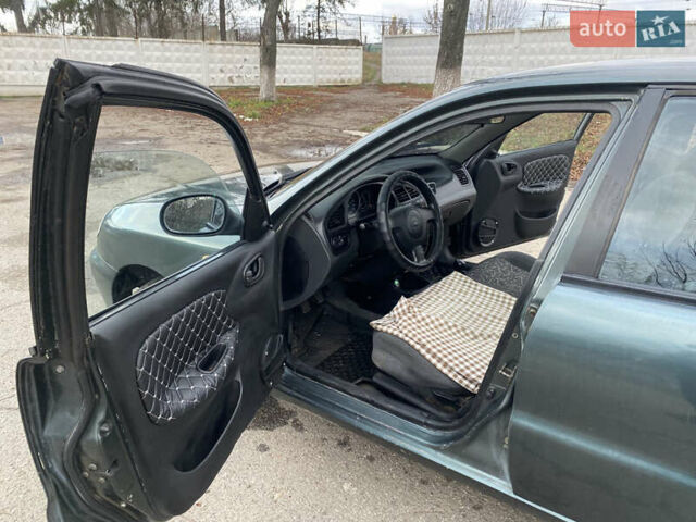 Серый Дэу Ланос, объемом двигателя 1.5 л и пробегом 432 тыс. км за 2400 $, фото 11 на Automoto.ua