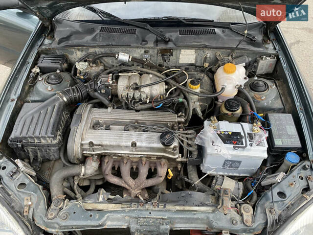 Серый Дэу Ланос, объемом двигателя 1.5 л и пробегом 432 тыс. км за 2400 $, фото 15 на Automoto.ua