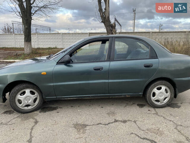 Серый Дэу Ланос, объемом двигателя 1.5 л и пробегом 432 тыс. км за 2400 $, фото 2 на Automoto.ua