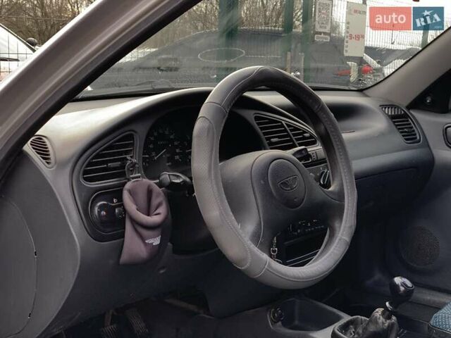 Серый Дэу Ланос, объемом двигателя 1.5 л и пробегом 164 тыс. км за 1655 $, фото 23 на Automoto.ua