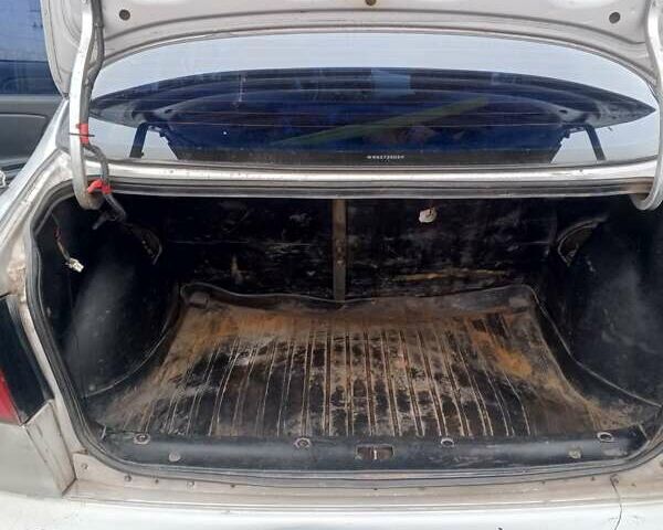 Серый Дэу Ланос, объемом двигателя 1.5 л и пробегом 400 тыс. км за 1650 $, фото 6 на Automoto.ua