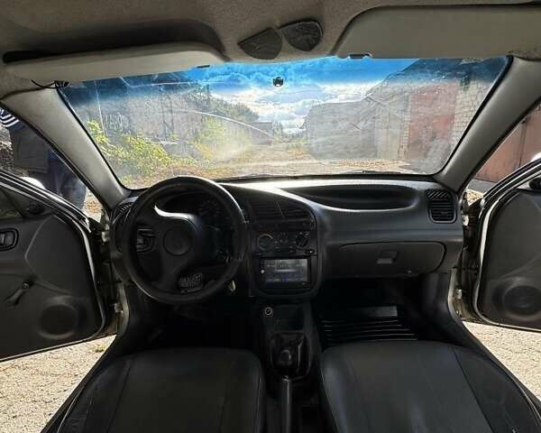 Серый Дэу Ланос, объемом двигателя 1.5 л и пробегом 400 тыс. км за 1800 $, фото 5 на Automoto.ua