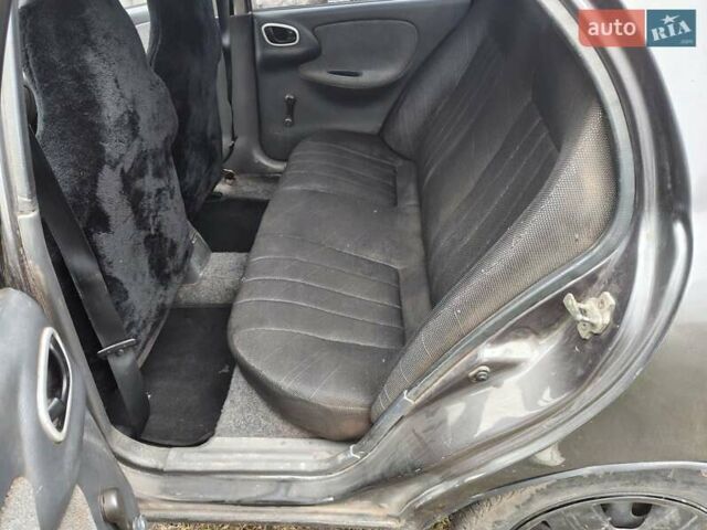 Серый Дэу Ланос, объемом двигателя 1.5 л и пробегом 217 тыс. км за 1700 $, фото 2 на Automoto.ua