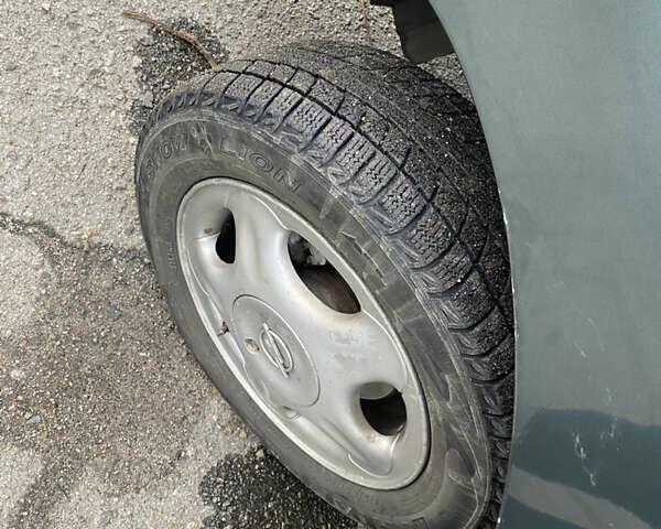 Серый Дэу Ланос, объемом двигателя 1.5 л и пробегом 432 тыс. км за 2400 $, фото 13 на Automoto.ua