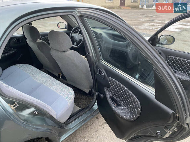 Серый Дэу Ланос, объемом двигателя 1.5 л и пробегом 432 тыс. км за 2400 $, фото 9 на Automoto.ua