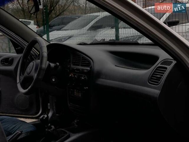 Серый Дэу Ланос, объемом двигателя 1.5 л и пробегом 164 тыс. км за 1655 $, фото 31 на Automoto.ua