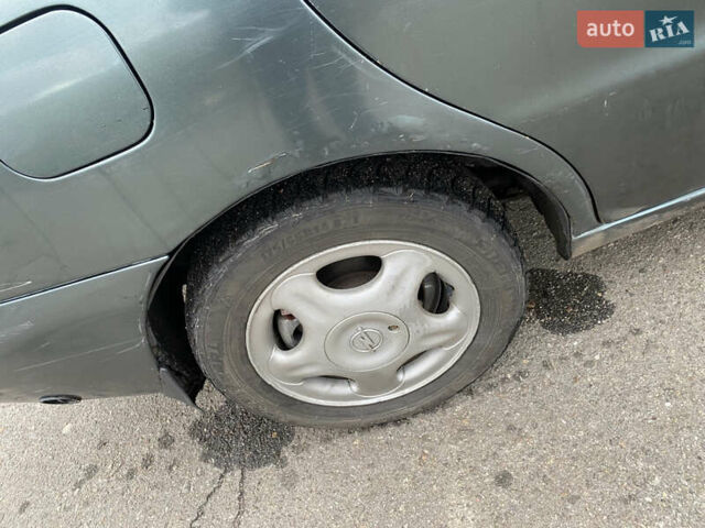 Серый Дэу Ланос, объемом двигателя 1.5 л и пробегом 432 тыс. км за 2400 $, фото 18 на Automoto.ua