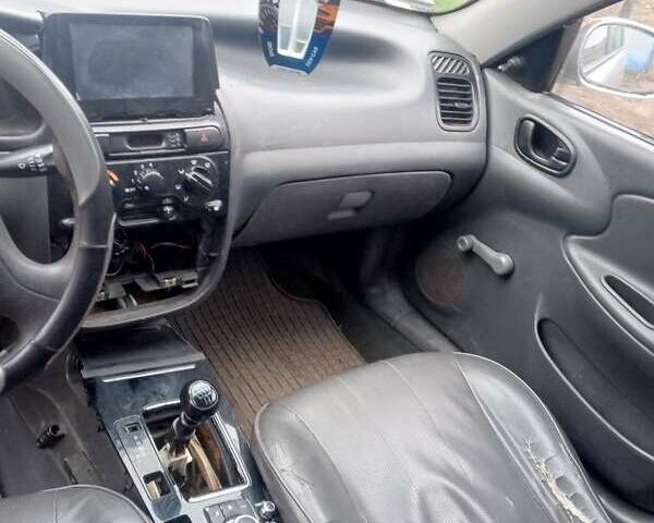 Серый Дэу Ланос, объемом двигателя 1.5 л и пробегом 400 тыс. км за 1650 $, фото 1 на Automoto.ua