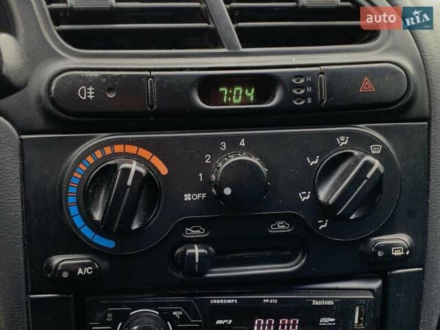 Серый Дэу Ланос, объемом двигателя 1.5 л и пробегом 164 тыс. км за 1655 $, фото 44 на Automoto.ua