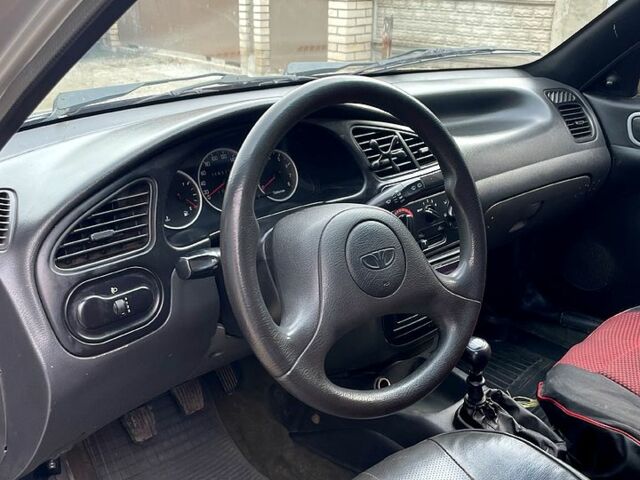 Серый Дэу Ланос, объемом двигателя 1.5 л и пробегом 218 тыс. км за 1100 $, фото 5 на Automoto.ua