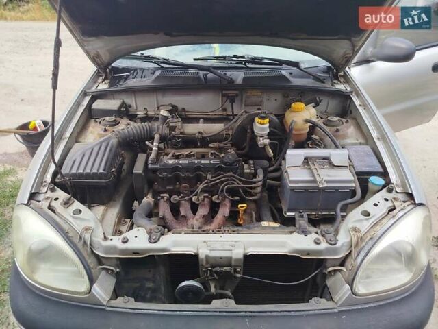 Серый Дэу Ланос, объемом двигателя 1.5 л и пробегом 316 тыс. км за 1650 $, фото 3 на Automoto.ua