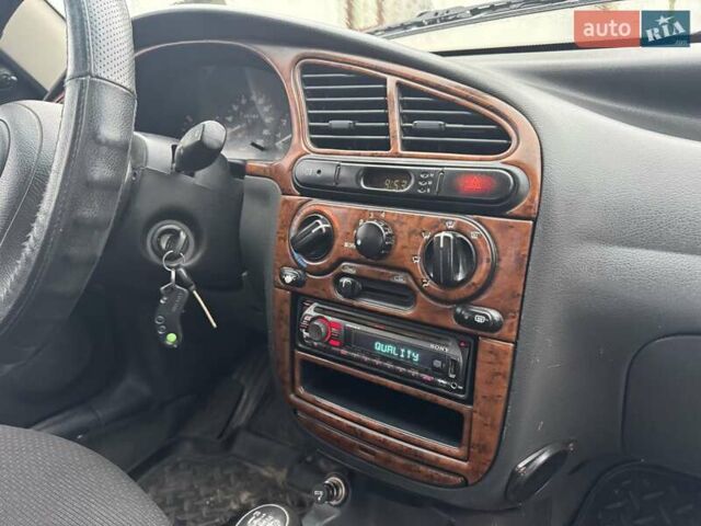 Серый Дэу Ланос, объемом двигателя 1.5 л и пробегом 200 тыс. км за 1580 $, фото 11 на Automoto.ua