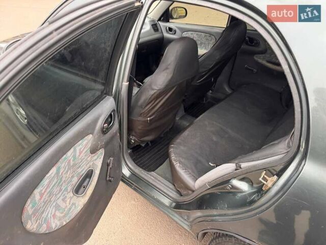 Серый Дэу Ланос, объемом двигателя 1.5 л и пробегом 250 тыс. км за 1250 $, фото 9 на Automoto.ua