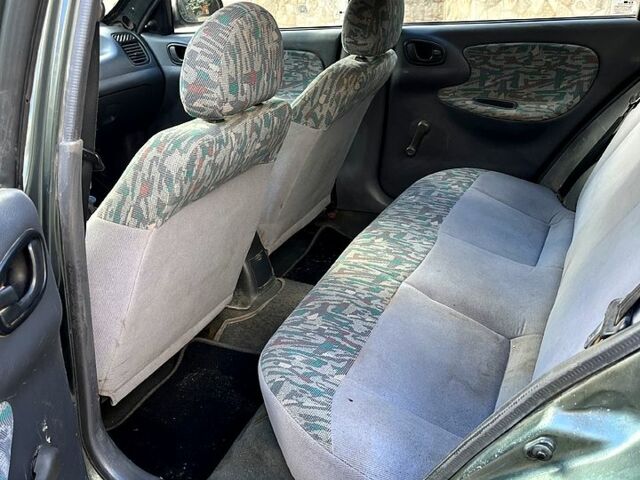 Серый Дэу Ланос, объемом двигателя 1.5 л и пробегом 308 тыс. км за 1335 $, фото 8 на Automoto.ua