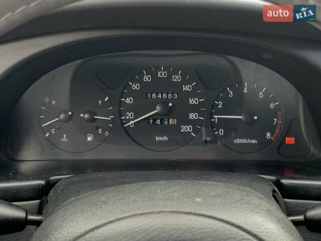 Серый Дэу Ланос, объемом двигателя 1.5 л и пробегом 164 тыс. км за 1655 $, фото 41 на Automoto.ua