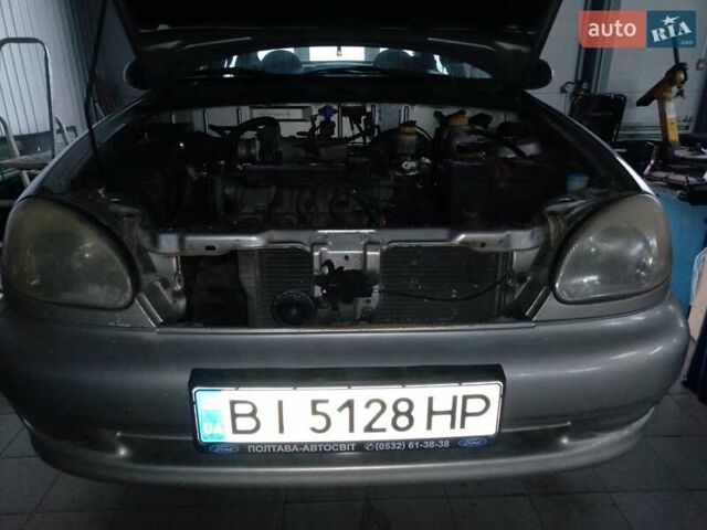 Сірий Деу Ланос, об'ємом двигуна 1.5 л та пробігом 200 тис. км за 2700 $, фото 2 на Automoto.ua