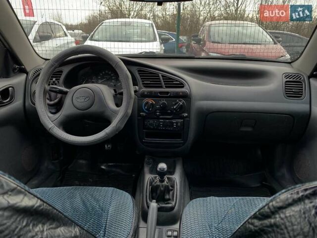 Серый Дэу Ланос, объемом двигателя 1.5 л и пробегом 164 тыс. км за 1655 $, фото 35 на Automoto.ua