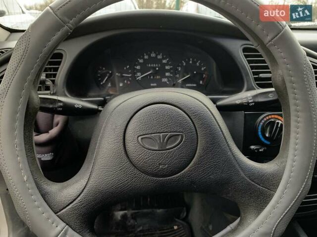 Серый Дэу Ланос, объемом двигателя 1.5 л и пробегом 164 тыс. км за 1655 $, фото 36 на Automoto.ua