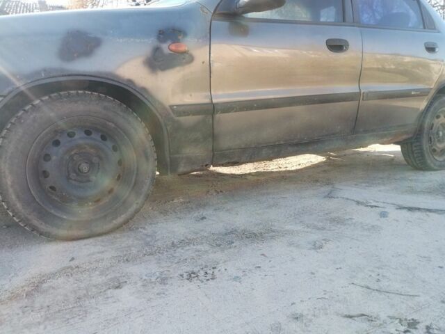 Сірий Деу Ланос, об'ємом двигуна 1.5 л та пробігом 220 тис. км за 1021 $, фото 1 на Automoto.ua