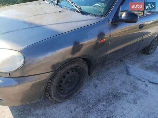 Серый Дэу Ланос, объемом двигателя 1.5 л и пробегом 220 тыс. км за 1021 $, фото 3 на Automoto.ua