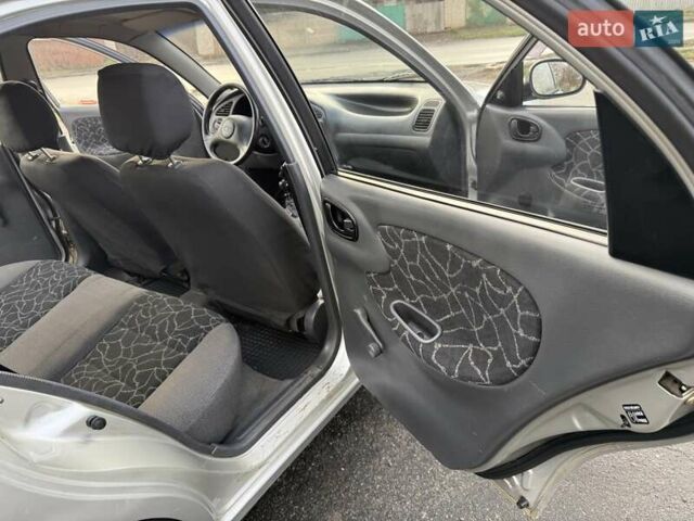 Сірий Деу Ланос, об'ємом двигуна 1.35 л та пробігом 116 тис. км за 1950 $, фото 11 на Automoto.ua