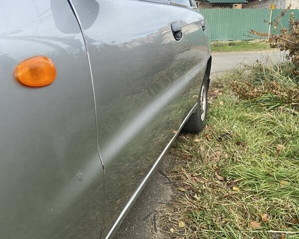 Серый Дэу Ланос, объемом двигателя 1.5 л и пробегом 334 тыс. км за 1800 $, фото 11 на Automoto.ua