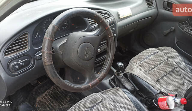 Сірий Деу Ланос, об'ємом двигуна 1.5 л та пробігом 147 тис. км за 2650 $, фото 3 на Automoto.ua