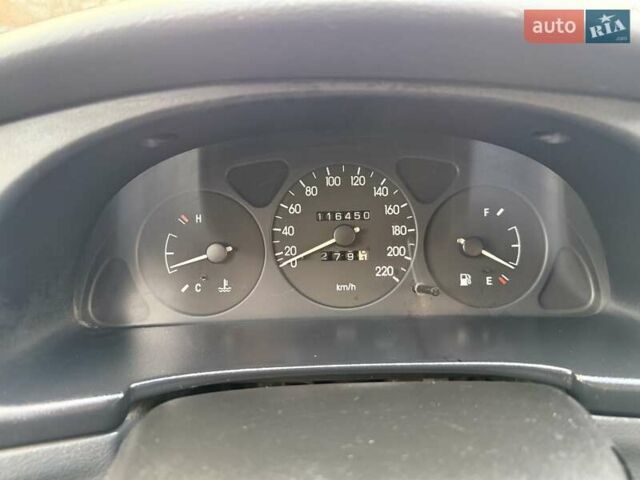 Сірий Деу Ланос, об'ємом двигуна 1.35 л та пробігом 116 тис. км за 1950 $, фото 15 на Automoto.ua