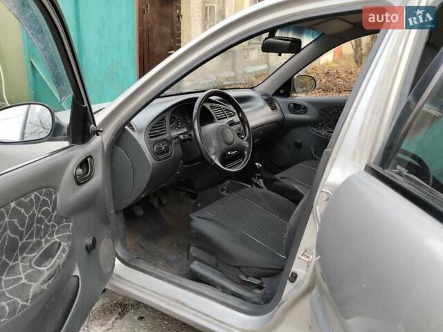 Сірий Деу Ланос, об'ємом двигуна 1.35 л та пробігом 117 тис. км за 1400 $, фото 1 на Automoto.ua