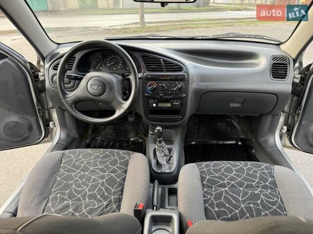 Сірий Деу Ланос, об'ємом двигуна 1.35 л та пробігом 116 тис. км за 1950 $, фото 10 на Automoto.ua