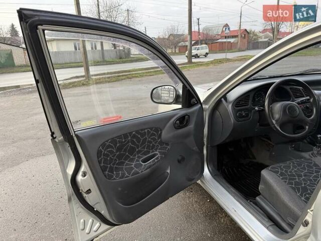 Сірий Деу Ланос, об'ємом двигуна 1.35 л та пробігом 116 тис. км за 1950 $, фото 8 на Automoto.ua