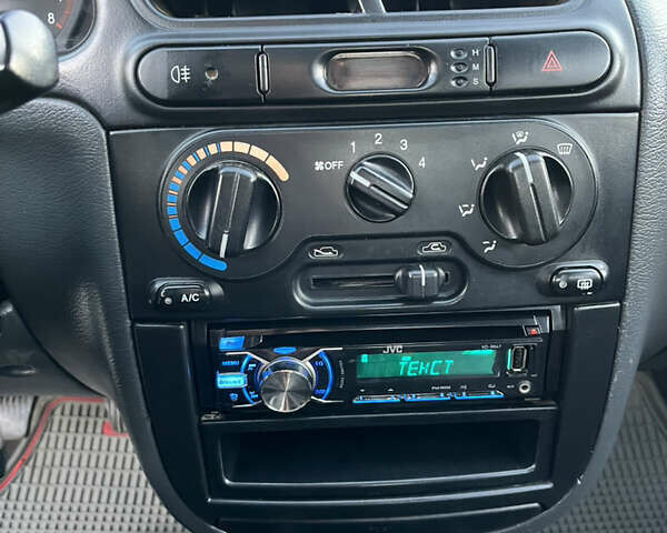 Серый Дэу Ланос, объемом двигателя 1.5 л и пробегом 152 тыс. км за 1999 $, фото 22 на Automoto.ua