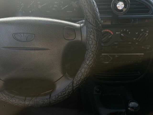 Сірий Деу Ланос, об'ємом двигуна 1.6 л та пробігом 221 тис. км за 3550 $, фото 6 на Automoto.ua