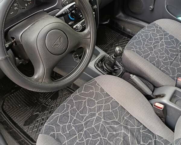 Серый Дэу Ланос, объемом двигателя 1.5 л и пробегом 115 тыс. км за 2650 $, фото 1 на Automoto.ua