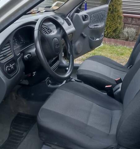 Серый Дэу Ланос, объемом двигателя 1.3 л и пробегом 204 тыс. км за 2000 $, фото 9 на Automoto.ua