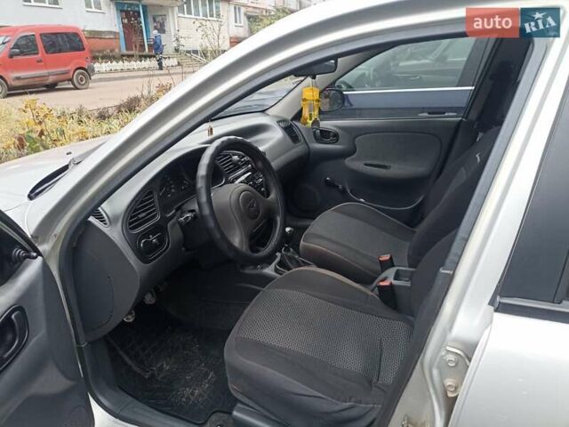 Сірий Деу Ланос, об'ємом двигуна 1.5 л та пробігом 306 тис. км за 2000 $, фото 9 на Automoto.ua